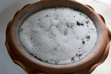 the sand in the ashtray