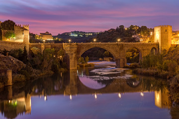 The Puente de San Martin in Toledo, Spain, before sunrise