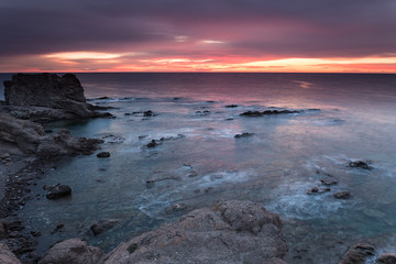 Sunrise on the coast of Escullos. Natural Park Cabo de Gata. Spain.