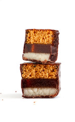 cut chocolate marzipan on white background