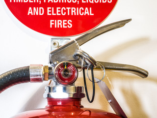 Dry chemical powder fire extinguisher and sign
