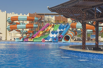 Fototapeta na wymiar Swimming pool with bar in a luxury tropical hotel resort