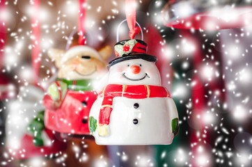 Snowman with ceramics. Christmas toy.