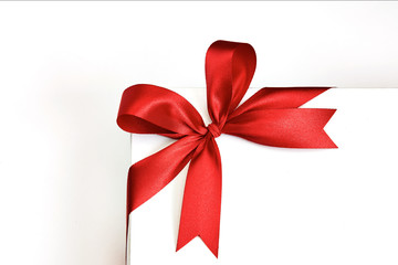 Red ribbon bow on white background.