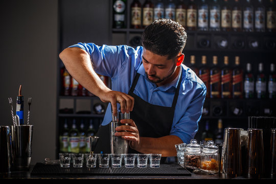Bartender preparing an alcoholic beverage