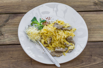 Tasty pasta with mushrooms and sauce