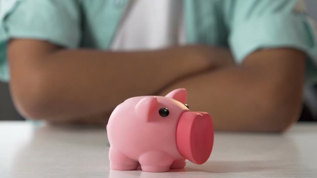 Kid Putting Coin In Piggy Bank, Saving Pocket Money, Financial Literacy For Kids