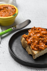 Toasted bread with different pates.