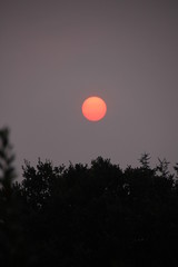 deep red sunrise in october