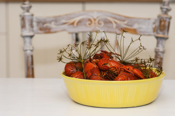 crawfish in yellow bowl