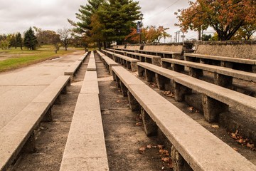 Old stone bleachers in a park setting