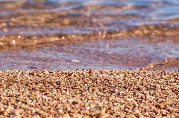 Sand beach macro, close up photography, stones and water
