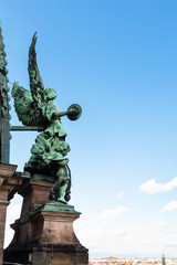 Fototapeta na wymiar angel figure on roof of Berlin Cathedral