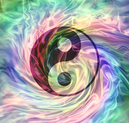 The merging of Yin Yang Energy - yin yang symbol on a rotating gaseous energy formation multicoloured background 
