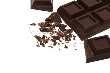 Broken chocolate bar isolated on white