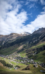 Fototapeta na wymiar vals village alpine valley landscape in central alps switzerland