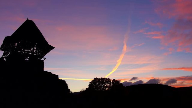Another sunset: Nevytsky Castle staring at relish and pinkish Sunset
