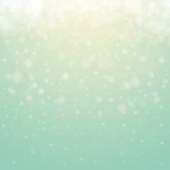 Christmas winter abstract background with snowflakes, bokeh lights and place for text. Christmas New Year's wallpaper