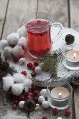 Cranberry tea, berries and New Year decor