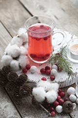 Cranberry tea, berries and New Year decor
