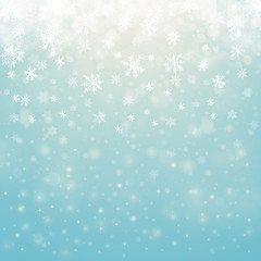 Fototapeta na wymiar Christmas winter abstract background with snowflakes, bokeh lights and place for text. Christmas New Year's wallpaper