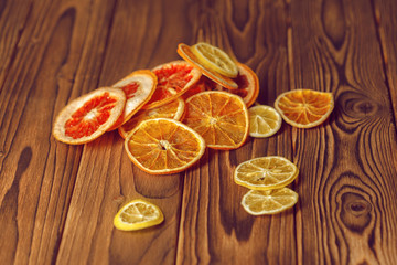 Dried orange and lemon slices background