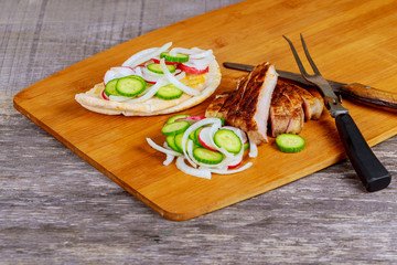 Grilled steak, French fries and vegetables