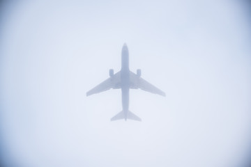 Airplane landing through the fog