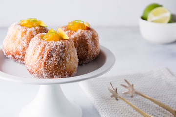 Kuglof with mango and lime. French bakery. Gugelhupf Kugelhopf. Copy space.