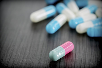 Fototapeta na wymiar Many Medicines Pills Capsules Of Diferent Size 