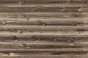 wooden lining boards wall. midtone timber brown wood texture. background old panels, Seamless...