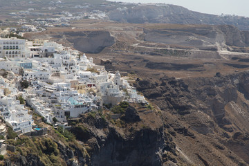 Landscape city architecture panorama with white houses on a mountain in Thira, Greece	