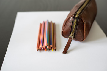 Colored pencils on white paper