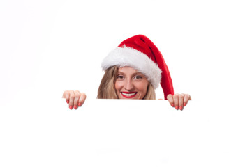 Christmas. Beautiful woman wear santa hat