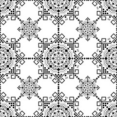 Ethnic black seamless pattern on a white background. Repeated  ornament  in style boho.