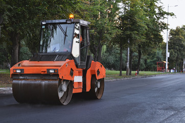 Asphalt roller in city