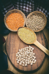 Top View Of Lentils, Chickpeas And Cracked Wheat On A Wooden Surface