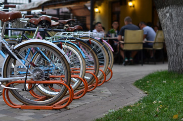 parked bicycles near restaurant