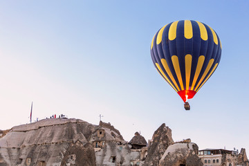 Fototapeta na wymiar Hot air balloon flying over view point at Cappadocia Turkey
