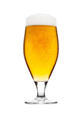 Cold glass of lager beer with foam and bubbles