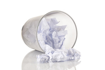 Metal trash can bin with paper