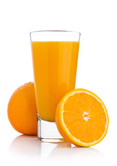 Glass of fresh orange juice with fruit bits
