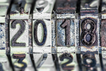 Old stamp with the number 2018 in closeup