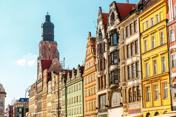 Fototapeta premium Fantastic view of the ancient homes on a sunny day. Location famous Market Square in Wroclaw, Poland, Europe. Historical capital of Silesia. Beauty world.