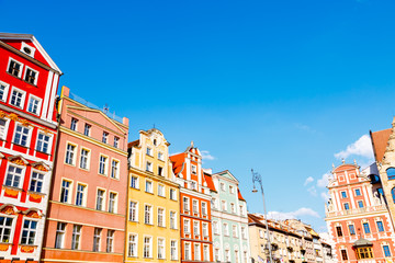 Fototapeta premium Fantastic view of the ancient homes on a sunny day. Location famous Market Square in Wroclaw, Poland, Europe. Historical capital of Silesia. Beauty world.