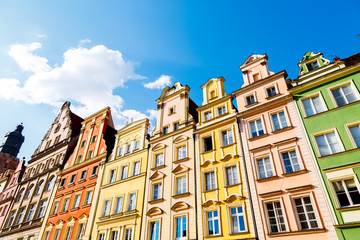 Fantastic view of the ancient homes on a sunny day. Location famous Market Square in Wroclaw, Poland, Europe. Historical capital of Silesia. Beauty world.