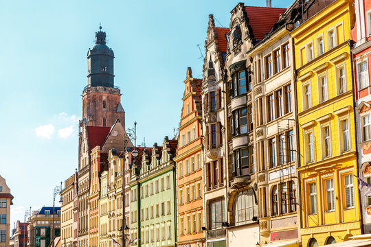 Fantastic view of the ancient homes on a sunny day. Location famous Market Square in Wroclaw, Poland, Europe. Historical capital of Silesia. Beauty world.