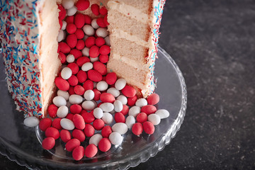 Tasty cake for baby shower party on table