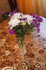 indoor vase with aster and chrysanthemum