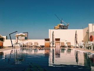 pool reflection on roof top in Dubai 